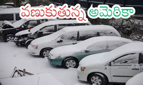 Snow-covered streets during a deadly winter storm in the United States Snow-covered streets during a deadly winter storm in the United States