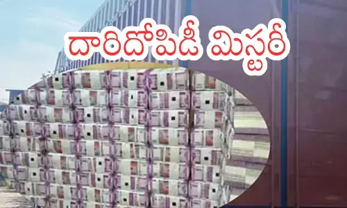 Containers allegedly carrying ₹400 crore cash linked to the Karnataka–Maharashtra mystery under police investigation.
