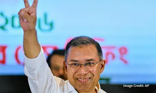 Bangladesh Nationalist Party Chairperson Tarique Rahman shows victory sign during a meeting with media after his party won the national parliamentary election, in Dhaka, Bangladesh, Saturday, Feb. 14, 2026. (AP Photo/Mahmud Hossain Opu)