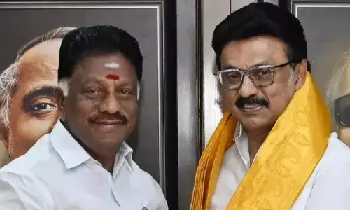 ex tamil nadu cm panneer selvam joins dmk
