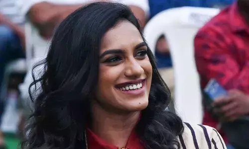 badminton star pv sindhu arrives in India safely