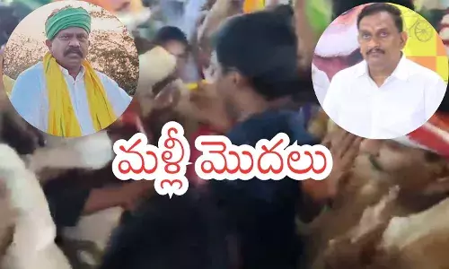Kesineni Chinni and Kolikapudi Srinivas Rao arguing during the Nemali Venugopala Swamy temple silk offering ceremony in Gampalagudem.