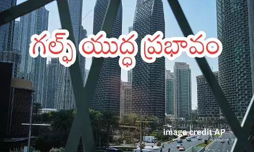 Smoke plume after Iranian strike seen near Dubai airport as Emirates plane remains parked