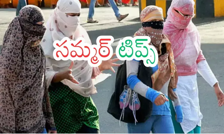 People protecting themselves from intense summer heat in Telugu states during a severe heatwave.