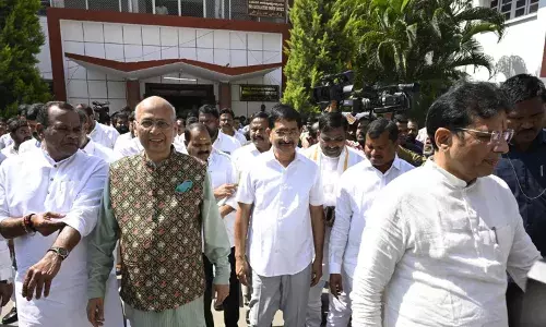 election officials announced that two congress candidates were unanimously elected in the rajya sabha elections