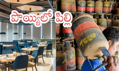Hyderabad hotel kitchen staff standing near empty commercial gas cylinders during the Hyderabad hotels crisis