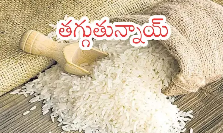 Rice sacks stacked in a market yard reflecting the recent rice price drop in Andhra Pradesh and Telangana. Rice sacks stacked in a market yard reflecting the recent rice price drop in Andhra Pradesh and Telangana.