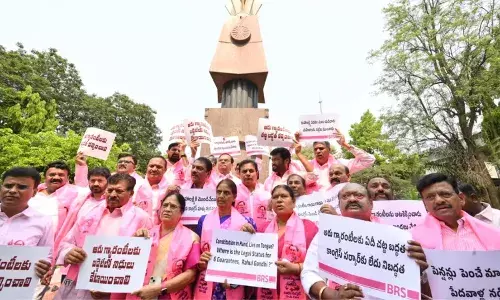brs leaders protested during the start of the budget session brs leaders protested during the start of the budget session