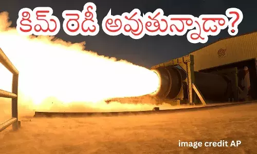 Kim Jong Un observing solid fuel missile engine ground test in North Korea