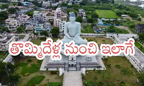 Farmers discussing Amaravati central offices delay and land compensation concerns in the capital region.