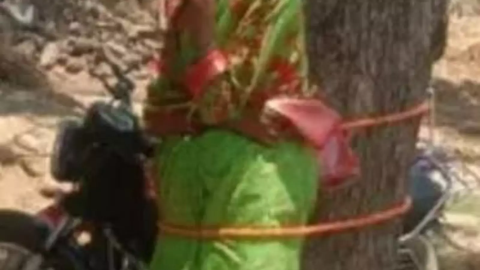 anganwadi teacher was tied to a tree by the lenders for not repaying the loan anganwadi teacher was tied to a tree by the lenders for not repaying the loan